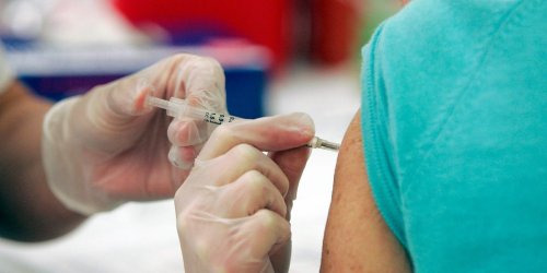 Here's how the government or your employer could legally make you get a COVID-19 vaccine, according to a law professor