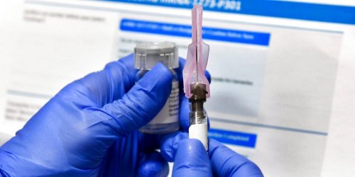 Moderna's coronavirus vaccine requires 2 shots given a month apart, which makes it tougher to get everyone fully inoculated