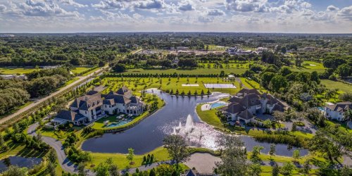 Next-door mansions built for identical twins are on sale in Florida for $54 million