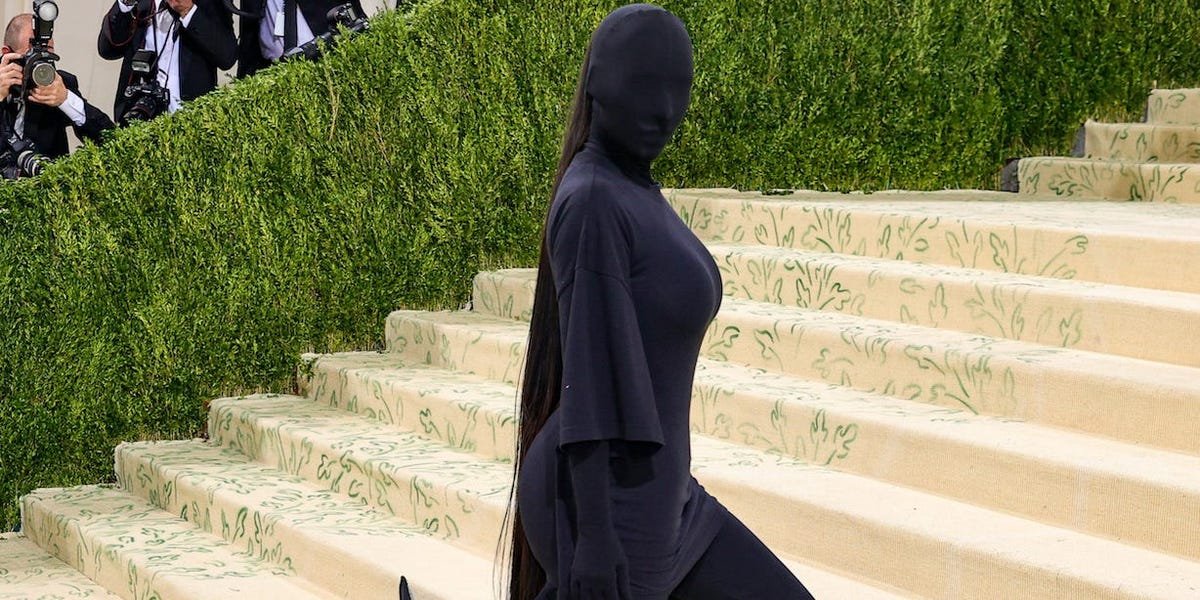 Kim Kardashian looked unrecognizable in a black bodysuit that covered her face at the Met Gala