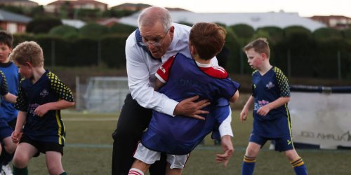 Australia's prime minister accidentally bowled over a kid while making a campaign stop with a local children's soccer team