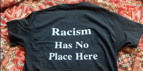 Whole Foods employee says workers were sent home for refusing to remove anti-racism shirts as the company faces protests over its dress-code policy