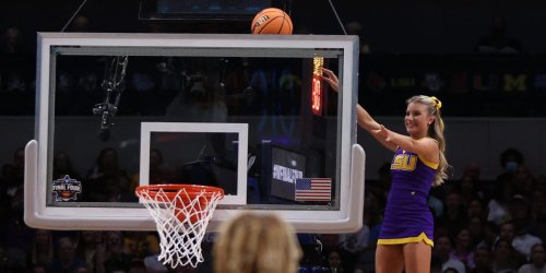 An LSU cheerleader pulled off an impressive stunt to retrieve a basketball stuck above the hoop at the Final Four