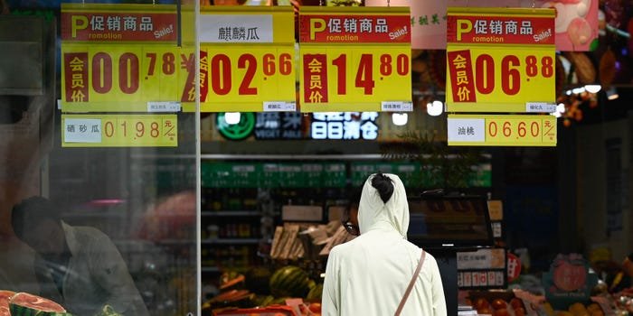 China slips into deflation, fueling more calls for economic stimulus