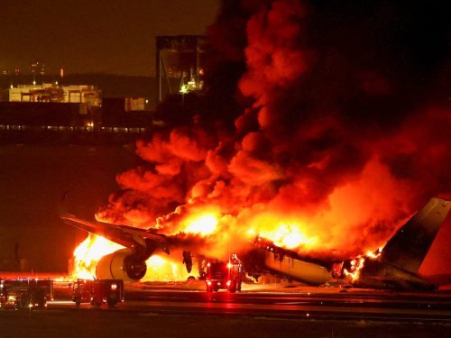 How hundreds of passengers escaped a burning Japan Airlines plane