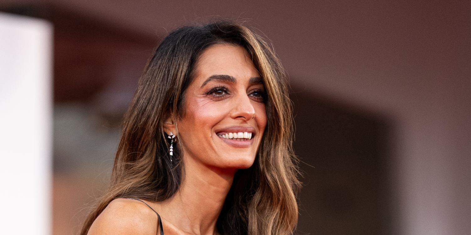 Amal Clooney Rewears a Red-Hot Skirt Suit With Towering Animal Print Stilettos for a Professional Outing
