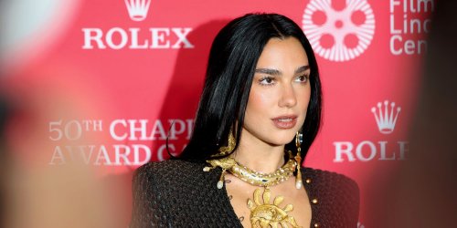 Dua Lipa Frees the Nipple in a See-Through "Snake Dress"