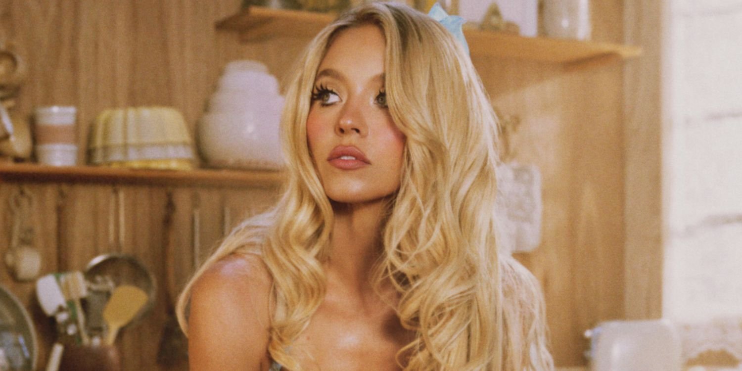 Sydney Sweeney Eats Cake in a Sheer Black Floral Bra, Thong, and Garter to Announce New Syrn Collection (Exclusive)