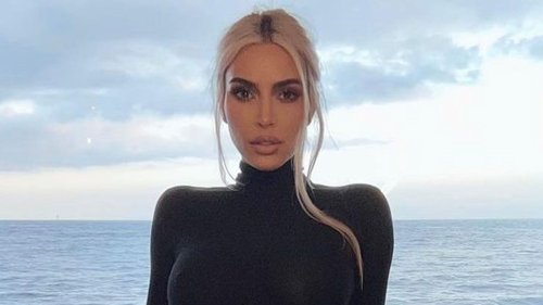 Kim Kardashian's Seaside Attire Included a Skin-Tight Dress With an Extreme Hip Cutout