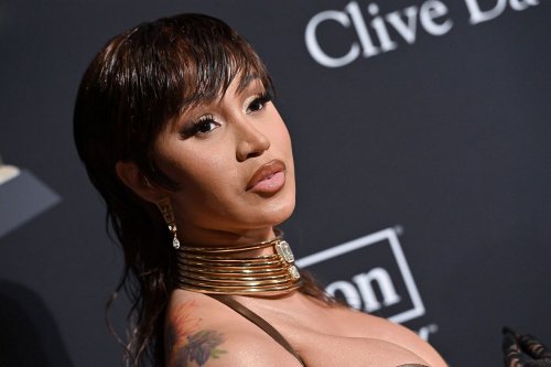 Cardi B Debuted a Mullet While Wearing a Patchwork Leather and See-Through Lace Gown