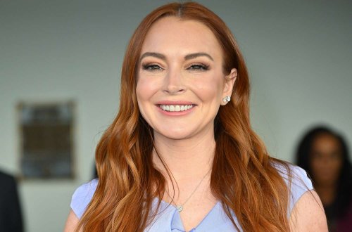 Lindsay Lohan's Plunging, Midriff-Baring Cutout Dress Expertly Showed Off Her Baby Bump