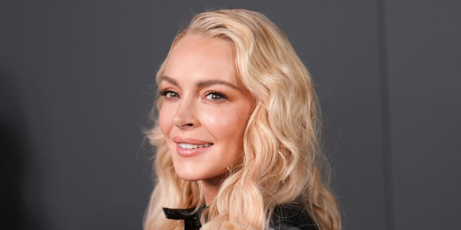 Lindsay Lohan Wears Black Swimsuit With the Tiniest Built-In Miniskirt for Family Yacht Trip