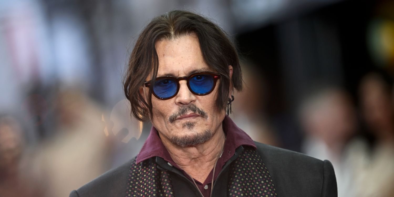 Johnny Depp Looks Unrecognizable With Long Curly Gray Hair and Mutton Chops