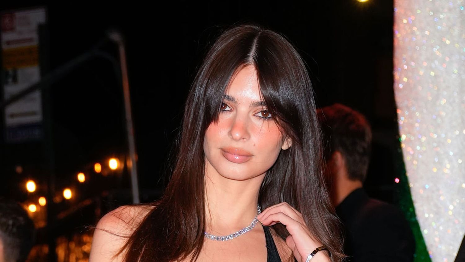 The Front of Emily Ratajkowski’s Plunging Holiday Dress Was Completely See-Through