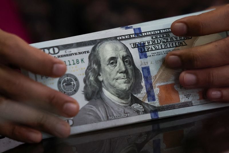 Dollar slumps as signs of deal to reopen Hormuz spur risk appetite