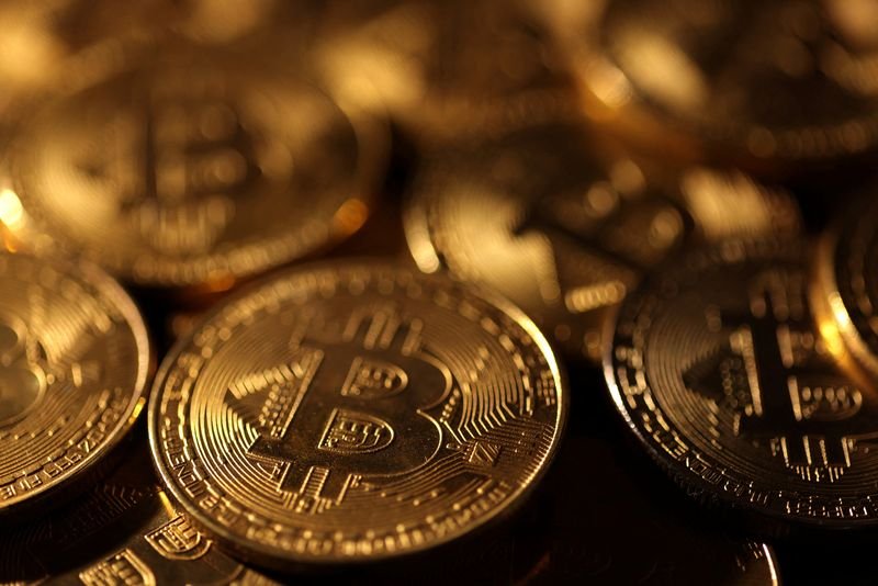 Bitcoin slumps with key $70,000 level in sight