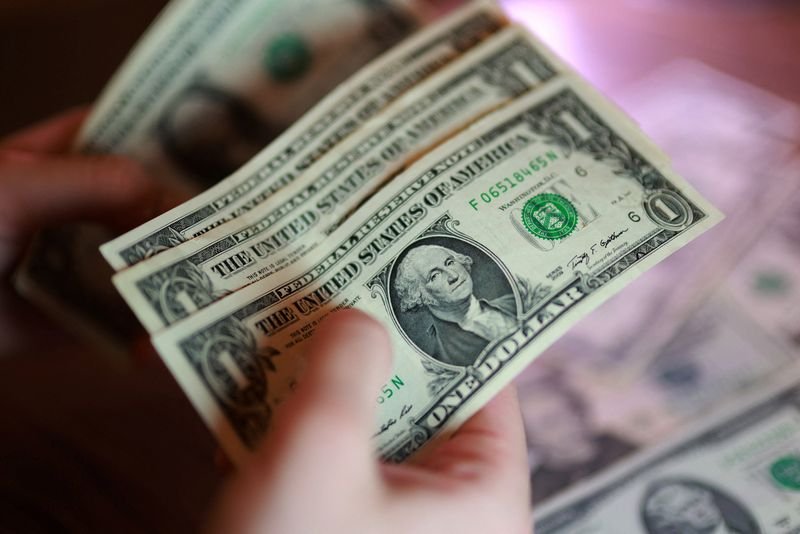 Dollar strengthens as confidence recovers, Fed hike bets trimmed