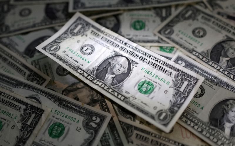 Dollar set for worst week in a year, yen pressured ahead of BOJ