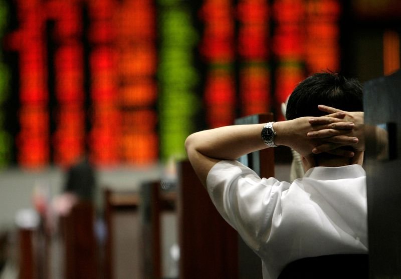 Asia stocks swept up in AI euphoria, oil slips on Gaza ceasefire deal