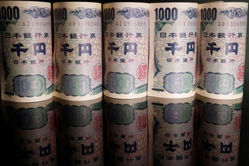 S&P affirms Japan debt rating but warns of cut if yen weakens much further