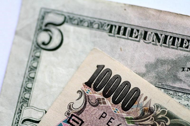 Asia FX muted, dollar steady as markets digest Fed rate cut; BOJ on tap