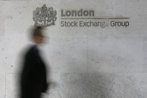 Commodity, banking stocks push FTSE 100 higher By Reuters