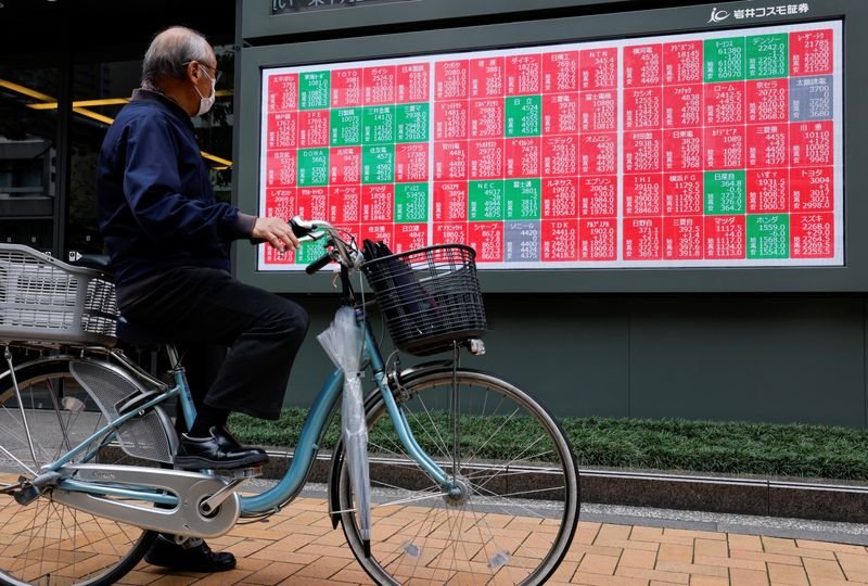 Asia stocks rise despite lingering AI worries, oil tempers losses after US-Iran talks