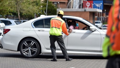 Hard work pays off for car guard turned MBA graduate