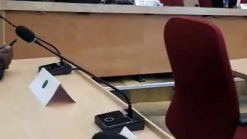WATCH: Chaos erupts as councillors climb on tables to stop council meeting