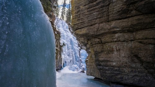 Hidden Below The Majestic Canadian Rockies Is A Canyon Carved By Waterfalls And Blanketed In Ice