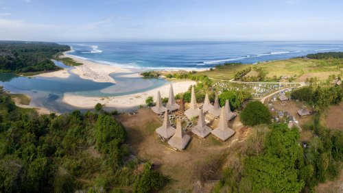 Swap Bali's Crowded Shores For This Gorgeous Indonesian Island With Palm-Lined Beaches And Natural Pools