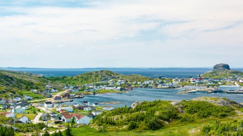 Canada's Remote Islands Where Wild Caribou Roam Offer Artful Stays, Tasty Eats, And Picturesque Villages