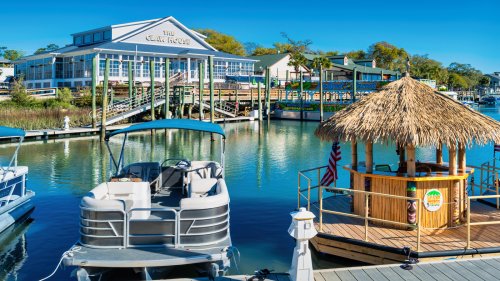 The 'Seafood Capital Of South Carolina' Is A Fishing Village With Pristine Beaches And Boardwalk Views