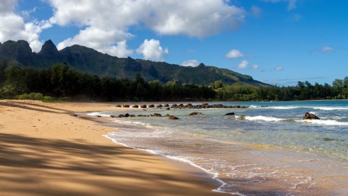A Peaceful, Secluded Beach Park On Kauai Offers A Serene Escape From Crowds To Enjoy Clear Waters