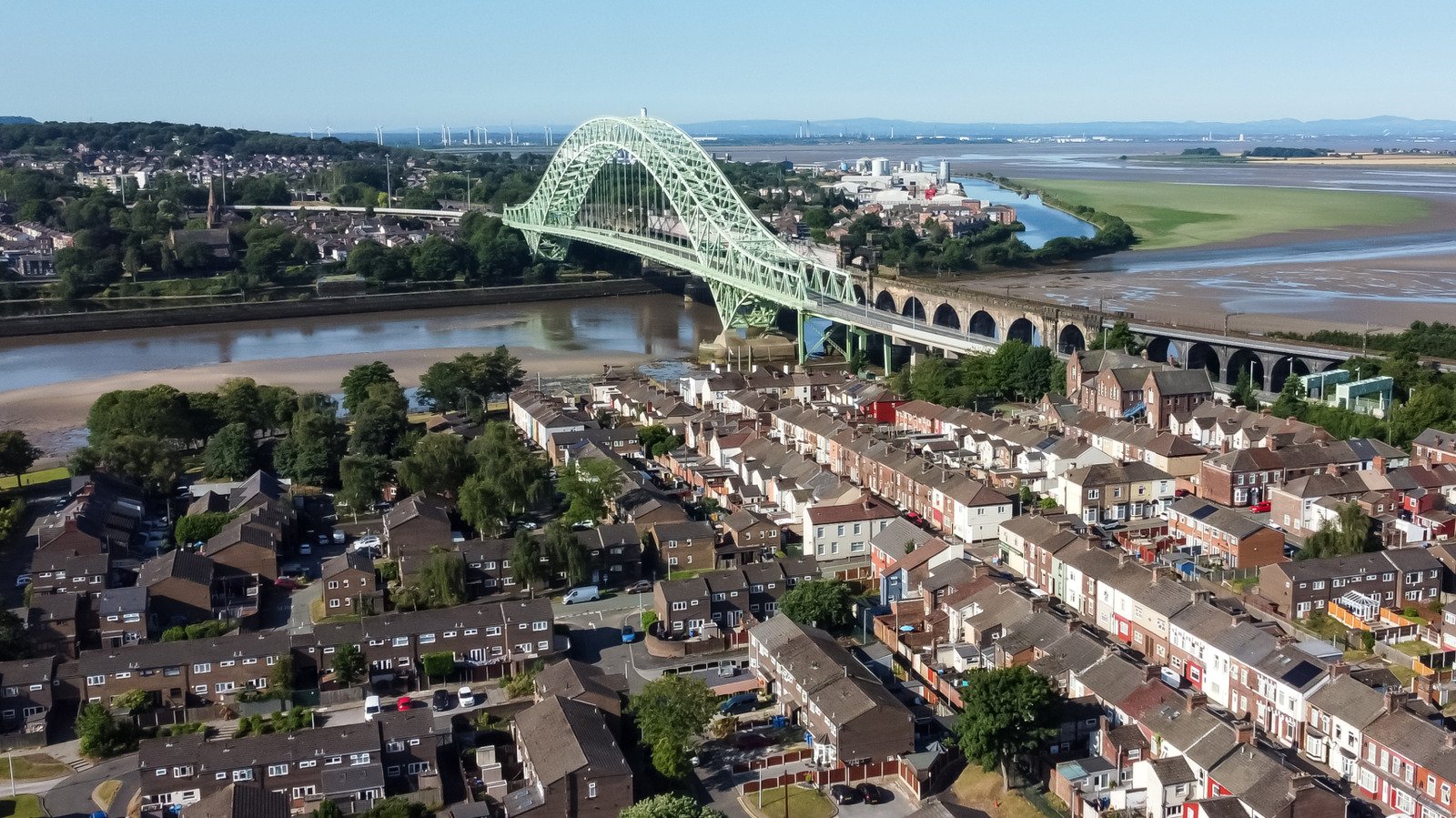Between Liverpool And Manchester Is A River Town With Shops, Scenic Green Spaces, And Historic Charm