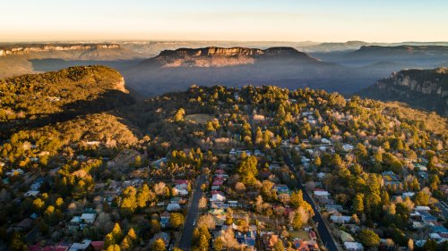 Hidden In Australia's Blue Mountains Is A Storybook Town With Cherry Blossoms And Scenic Waterfalls