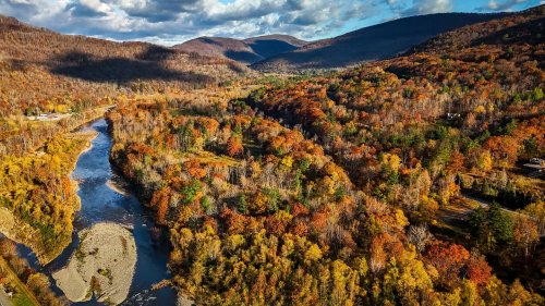 A Scenic Resort Hidden In New York's Catskills Offers Cozy Cabins, Mountain Air, And Serene Swimming Spots