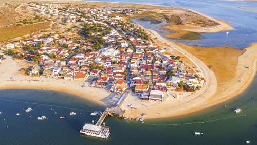 Escape The Masses At Portugal's Wildly Underrated White Sand Algarve Island Full Of Beachfront Rentals