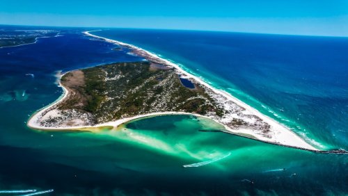 Florida's Undeveloped Barrier Island Is A Glistening Beachy Paradise Hidden On The Emerald Coast