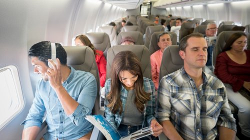 The Best And Easiest Ways To Make The Most Of A Long Flight In The Middle Seat