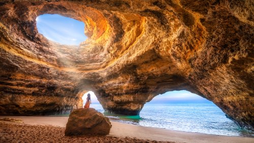 This Stretch Of Portugal's Coast Offers An Enchanting Sea Cave And One Of The World's Prettiest Beaches