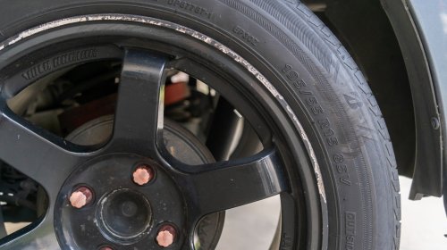 Curb Rash Ruining Your Rims? Your Tire Choice Could Be The Culprit