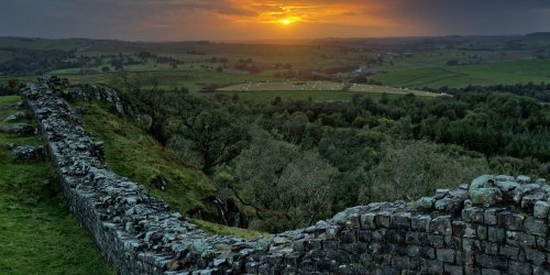 Why did the Romans abandon Britain in AD 410?