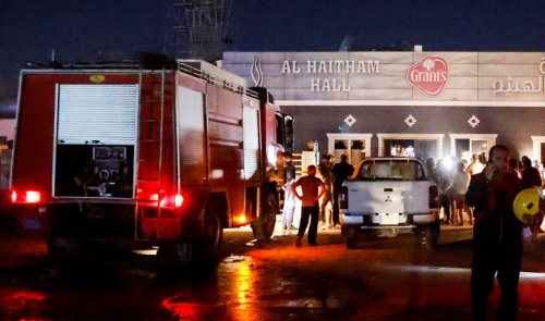 Thousands mourning in Christian town in Iraq after wedding hall fire