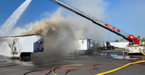 Fire erupts in semitrailer with combustibles