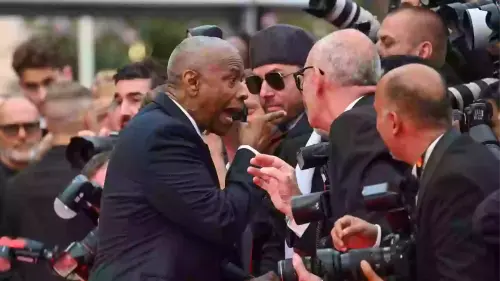 Denzel Washington furiously reacts after photographer appears to grab him on Cannes red carpet