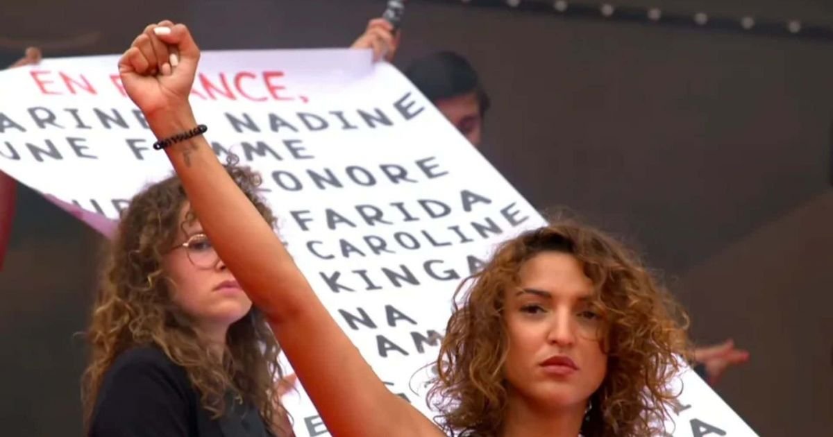 Festival de Cannes : « Les colleuses » déroulent une banderole en hommage à 129 victimes de féminicides