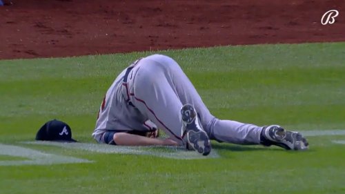 Video: Max Fried smacks his head on ground after making throw