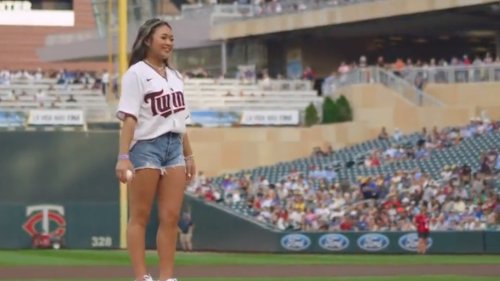 Epic photo of Olympic gymnast throwing out first pitch goes viral