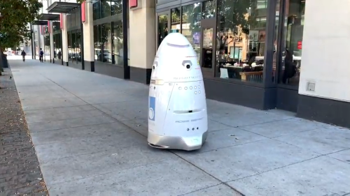 Security Robot Patrolling a Sidewalk in San Francisco